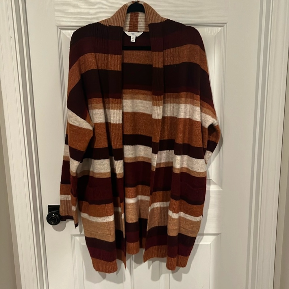 Maroon, burnt orange, cream/white cozy sweater. Never worn. Just took tags off.